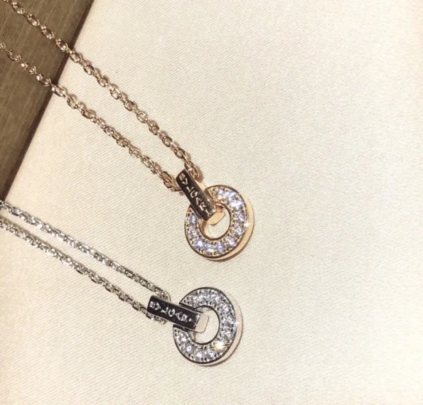 Bvlgari pendant necklace in silver and gold hardware